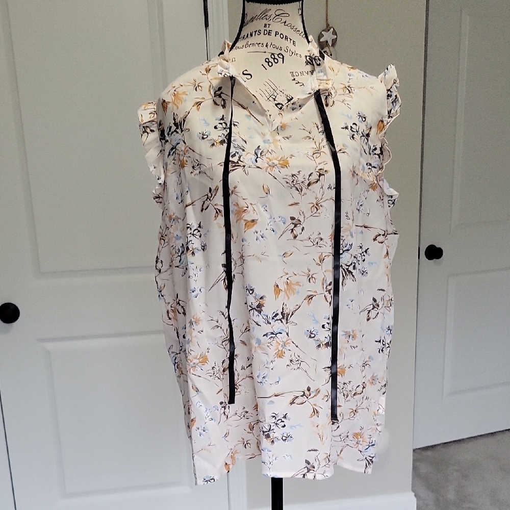 Sleeveless Ruffled Blouse with Tie Front